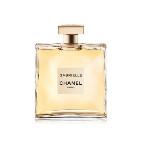 Chanel Gabrielle woda perfumowana 100 ml flakon ze złotą esencją obok pudełka z portretem Coco Chanel