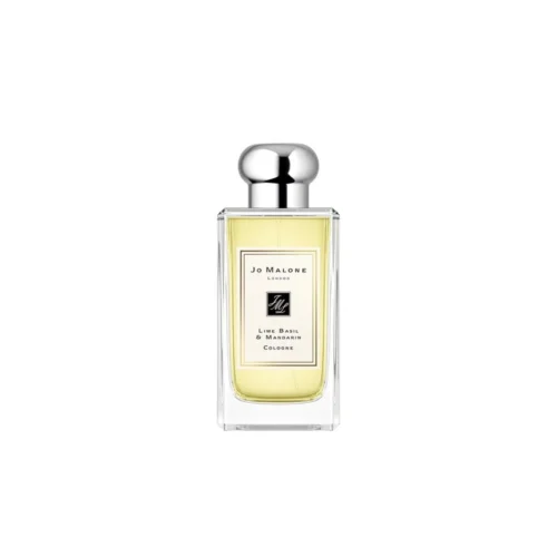 Jo_Malone_Lime_Basil_&_Mandarin_1 Klasyczny flakon Jo Malone Lime Basil & Mandarin 100ml na tle soczystych cytrusów i świeżych ziół.