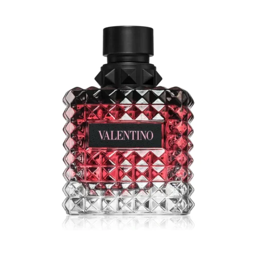 Valentino_Donna_Born_In_Roma_Intense_Women_2 Czarny, ćwiekowany flakon Valentino Donna Born In Roma Intense EDP 100ml na eleganckim tle.