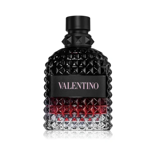 Valentino_Uomo_Born_In_Roma_Intense_1 Czarny flakon z ćwiekami Valentino Uomo Born In Roma Intense EDP 100ml na tle nocnego Rzymu.