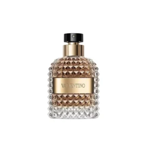 Złoty, ćwiekowany flakon Valentino Uomo Born In Roma The Gold EDT 100ml na luksusowym tle.